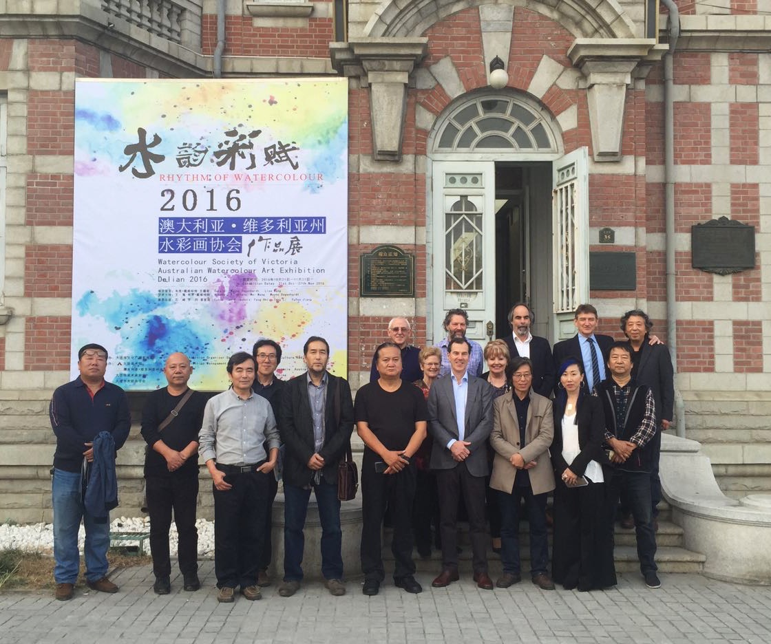 Picture taken standing outside the Dalain Art Museum before the opening of the Exhibition with the ten invited artists and officials.